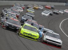 Joey Logano, Paul Menard and Brad Keselowski lead the field on a restart during Saturday’s race, which only had two cautions for nine laps and featured 11 lead changes among seven drivers. Credit: Jonathan Daniel/Getty Images